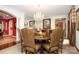 Dining area with hardwood floors, bright lighting, and decorative accents at 419 Park Ridge Rd, Albemarle, NC 28001