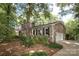 Charming stone home with a brick accent, featuring a two-car garage and beautifully landscaped front yard at 419 Park Ridge Rd, Albemarle, NC 28001