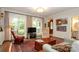 Bright living room featuring large windows, and classic furnishings at 419 Park Ridge Rd, Albemarle, NC 28001
