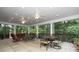 Expansive covered patio featuring ceiling fans and ample seating, creating an ideal outdoor living space at 419 Park Ridge Rd, Albemarle, NC 28001