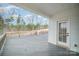 Spacious back deck offers outdoor living with lovely views of wooded backyard and nature at 4604 Howie Ln, Harrisburg, NC 28075