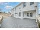 Large wooden deck on a modern house perfect for outdoor activities and enjoyment at 4604 Howie Ln, Harrisburg, NC 28075