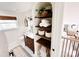 Chic bathroom with a dark wood vanity, decorative shelving, and a patterned tile floor at 5057 Murrayhill Rd, Charlotte, NC 28210