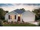 Charming single-story home with a well-manicured lawn and neutral siding at 5235 Reedy Ridge Rd, Charlotte, NC 28215