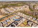Overhead view of a community showcasing houses and neighborhood featuring well-maintained landscaping and community layout at 646 Kahana River Rd, Fort Mill, SC 29715