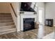 Cozy fireplace with a decorative mantle, creating a warm and inviting focal point in the living area at 646 Kahana River Rd, Fort Mill, SC 29715