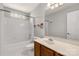Bathroom featuring a single sink vanity, full tub and shower combination and vinyl flooring at 9138 Babbitt Way, Charlotte, NC 28216