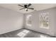 Inviting bedroom with natural light, neutral carpet, and contemporary ceiling fan at 9138 Babbitt Way, Charlotte, NC 28216