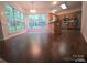 Open breakfast area adjacent to the kitchen, flooded with natural light through large windows at 9138 Babbitt Way, Charlotte, NC 28216
