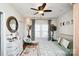 Bright bedroom featuring a bohemian aesthetic, hardwood floors, and stylish decor at 101 Sunset Dr, Stanley, NC 28164