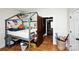 Bedroom with loft bed and wood floors, with a hallway view at 101 Sunset Dr, Stanley, NC 28164