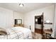 Comfortable bedroom with hardwood floors, natural light, and stylish decor creating a relaxing retreat at 101 Sunset Dr, Stanley, NC 28164