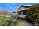 Shows siding with covered porch at 101 Sunset Dr, Stanley, NC 28164