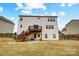 Exterior backyard view of a two-story house with a deck at 11296 Serenity Farm Dr, Midland, NC 28107