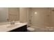 Bathroom featuring a tub-shower combo, vanity sink, and modern fixtures at 113 Burlingame Ct # D, Mooresville, NC 28117