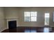 Comfortable living area showcasing a cozy fireplace, recessed lighting, and natural light at 113 Burlingame Ct # D, Mooresville, NC 28117