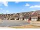 A wide street features a row of well-maintained townhomes in a suburban neighborhood at 113 Burlingame Ct # D, Mooresville, NC 28117
