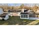 Overhead shot of a home featuring a sunroom and shed in a spacious, fenced backyard at 11501 Candlelight Ct, Charlotte, NC 28226