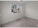 Bright bedroom with carpet and a large window offering outside views at 11501 Candlelight Ct, Charlotte, NC 28226
