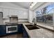 A kitchen features stainless steel appliances, granite countertops, and a window over the sink at 11501 Candlelight Ct, Charlotte, NC 28226