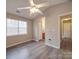 Bedroom with a fan and large window providing natural light at 12601 Tucker Crossing Ln, Charlotte, NC 28273