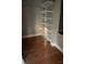 Walk-in closet features hardwood floors and wire shelving units at 12662 Woodside Falls Rd, Pineville, NC 28134