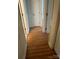 Hallway with wooden floors and white trim at 12662 Woodside Falls Rd, Pineville, NC 28134