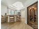 Stylish bar area with seating, modern cabinets, and a unique metal door at 129 Tuckernuck Dr, Mooresville, NC 28117