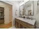 Elegant bathroom featuring double sinks, marble countertops, and modern fixtures at 129 Tuckernuck Dr, Mooresville, NC 28117