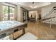 Large game room with air hockey, ping pong table, and basketball arcade game at 129 Tuckernuck Dr, Mooresville, NC 28117