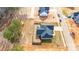 Aerial view of a property with a fenced backyard in a developing neighborhood at 136 Falls Leaf Dr, Troutman, NC 28166