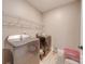 Laundry room featuring modern washer and dryer with wire rack for storage at 136 Falls Leaf Dr, Troutman, NC 28166