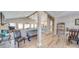 Open-concept living space with kitchen, dining area, and comfortable seating at 136 Falls Leaf Dr, Troutman, NC 28166