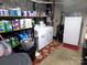 Practical laundry area with modern washer and dryer, shelving, and storage solutions at 1609 Indian Springs Nw Dr # 35, Conover, NC 28613
