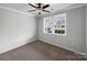 Comfortable bedroom with ceiling fan and large windows offering plenty of natural light at 1844 Burlington Dr, York, SC 29745
