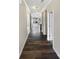 Inviting hallway featuring hardwood floors and neutral paint tones at 1844 Burlington Dr, York, SC 29745