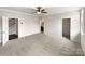Large main bedroom showing a ceiling fan and entrances to the closet and bathroom at 1844 Burlington Dr, York, SC 29745