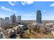 Attractive cityscape view showcases skyscrapers, tree-lined streets, and a bright blue sky at 210 N Church St # 1612, Charlotte, NC 28202