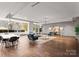 Modern resident lounge featuring comfortable seating, dining, and contemporary finishes at 210 N Church St # 1612, Charlotte, NC 28202