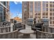 Outdoor lounge featuring modern patio furniture and BBQ grills perfect for relaxation and entertaining at 210 N Church St # 1612, Charlotte, NC 28202