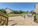 Spacious backyard featuring a built-in grill area and a well-manicured lawn at 274 Sweet Briar Dr, Fort Mill, SC 29707