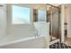 Relax in this tub with a view, complemented by a separate shower with a glass door at 274 Sweet Briar Dr, Fort Mill, SC 29707