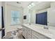 A bathroom with double vanity, a window, and a separate toilet at 274 Sweet Briar Dr, Fort Mill, SC 29707