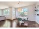 Bright breakfast room with a round table, modern chairs, and abundant natural light from large windows at 274 Sweet Briar Dr, Fort Mill, SC 29707