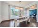 Bright dining room with modern decor, a view into the office, and hardwood floors at 274 Sweet Briar Dr, Fort Mill, SC 29707