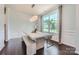 Bright dining room featuring a large window and modern light fixture at 274 Sweet Briar Dr, Fort Mill, SC 29707