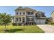 Charming two-story home with a well-manicured lawn and a two-car garage at 274 Sweet Briar Dr, Fort Mill, SC 29707