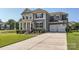 Beautiful two-story home with attached two-car garage and basketball hoop at 274 Sweet Briar Dr, Fort Mill, SC 29707