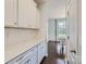 Hallway with built in cabinets and countertops leading to breakfast room at 274 Sweet Briar Dr, Fort Mill, SC 29707