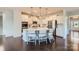 Modern kitchen with white cabinetry, stainless steel appliances, and a spacious island at 274 Sweet Briar Dr, Fort Mill, SC 29707